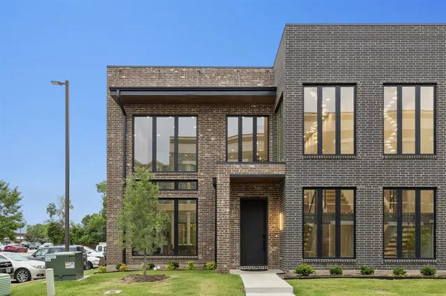 a view of a building with yard