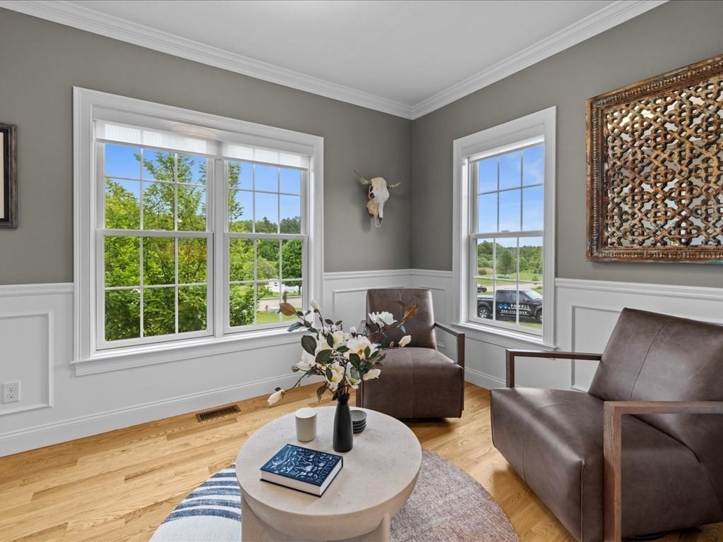 10 Beech Street Millis, MA 02054 - Photo 11 of 40 a living room with furniture and a large window