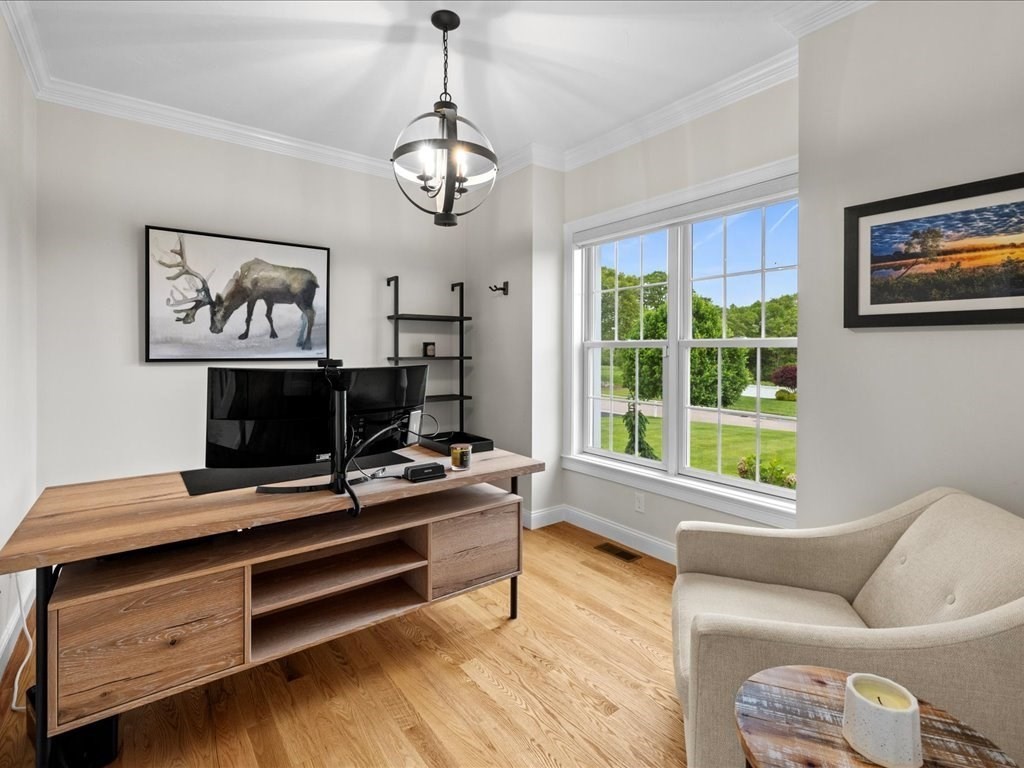 10 Beech Street Millis, MA 02054 - Photo 12 of 40 a living room with furniture and a window