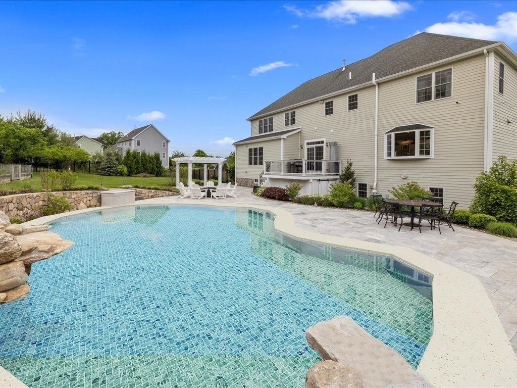 10 Beech Street Millis, MA 02054 - Photo 16 of 40 a front view of a house with garden