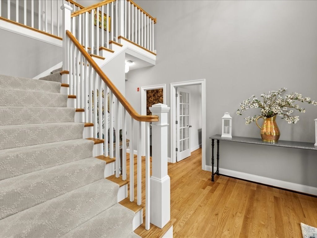 10 Beech Street Millis, MA 02054 - Photo 17 of 40 a view of entryway and hall with wooden floor