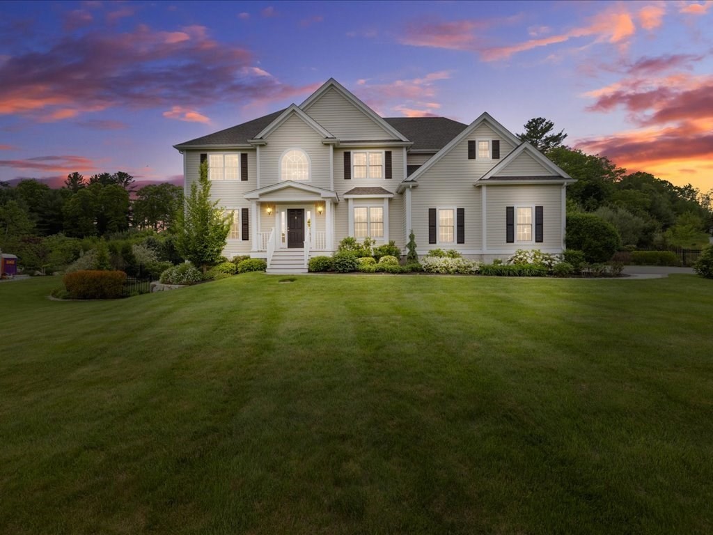 10 Beech Street Millis, MA 02054 - Photo 2 of 40 a front view of a house with a garden