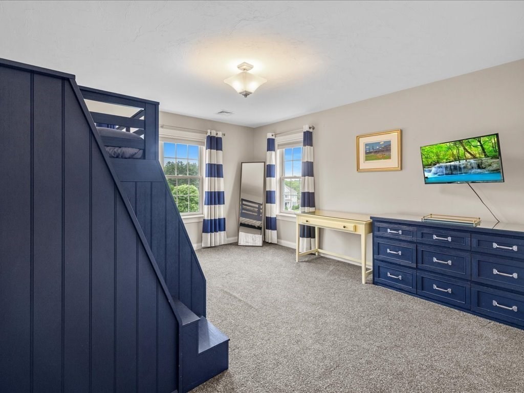 10 Beech Street Millis, MA 02054 - Photo 24 of 40 a view of a bedroom with furniture and window