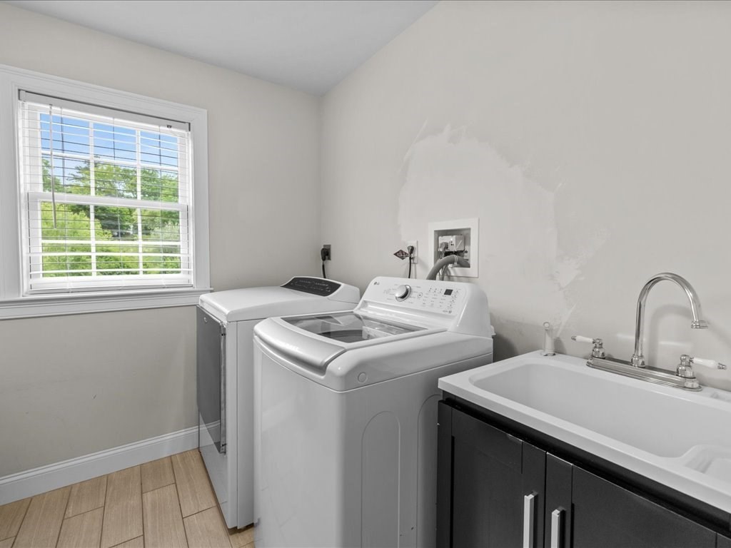 10 Beech Street Millis, MA 02054 - Photo 25 of 40 a utility room with dryer and washer