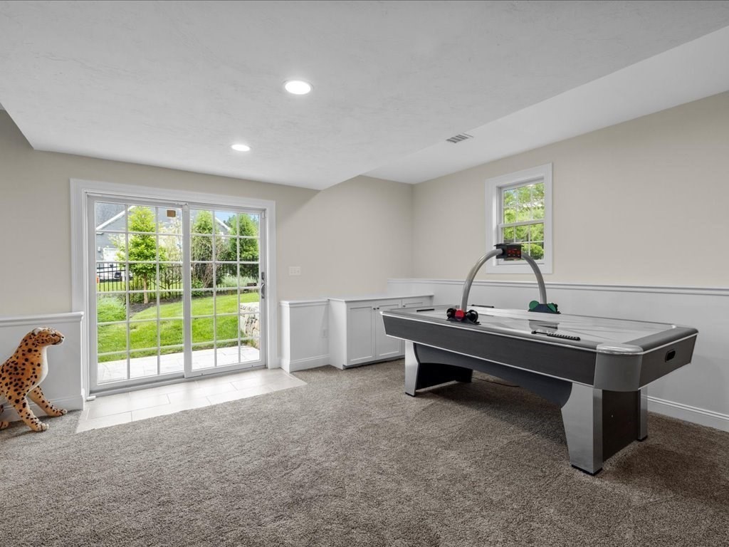10 Beech Street Millis, MA 02054 - Photo 28 of 40 a view of a room with a large window and pool table