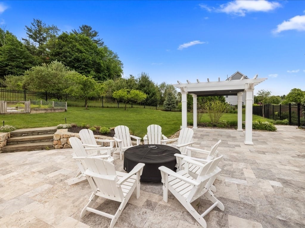 10 Beech Street Millis, MA 02054 - Photo 29 of 40 a backyard of a house with table and chairs
