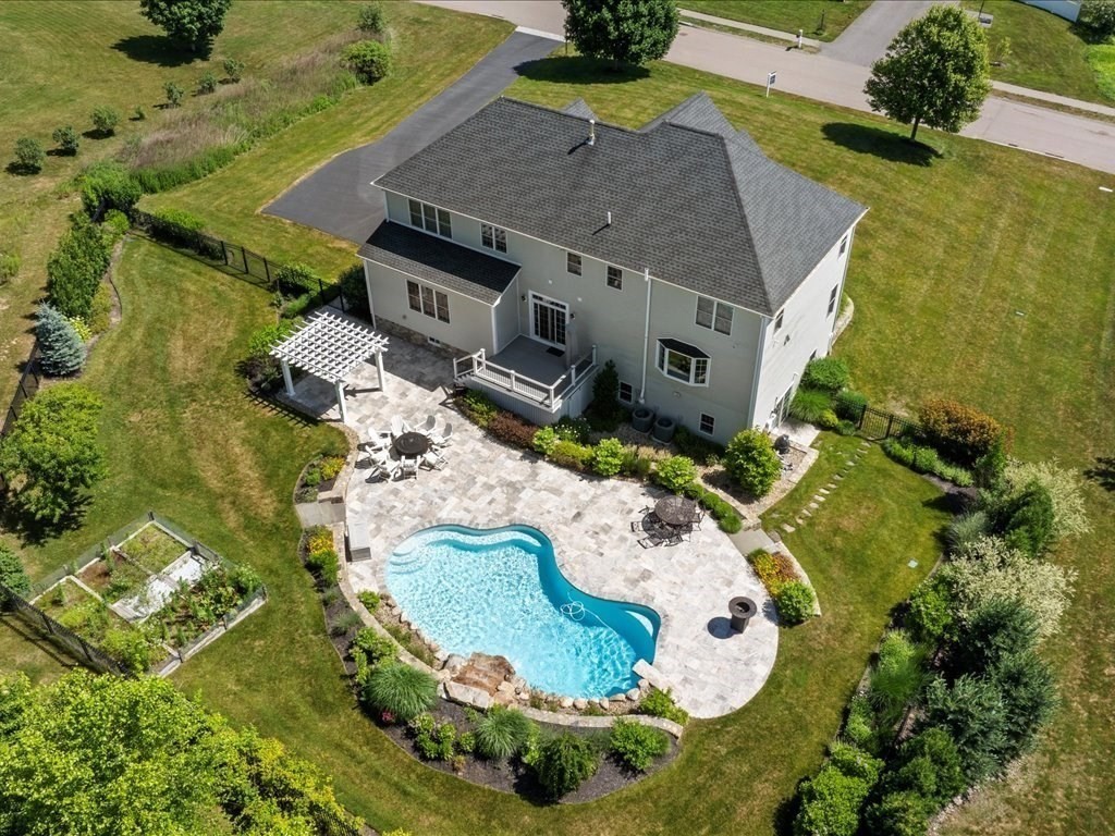 10 Beech Street Millis, MA 02054 - Photo 35 of 40 an aerial view of a house with a swimming pool