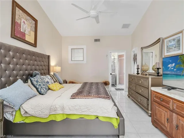 a bed room with a bed and a couch