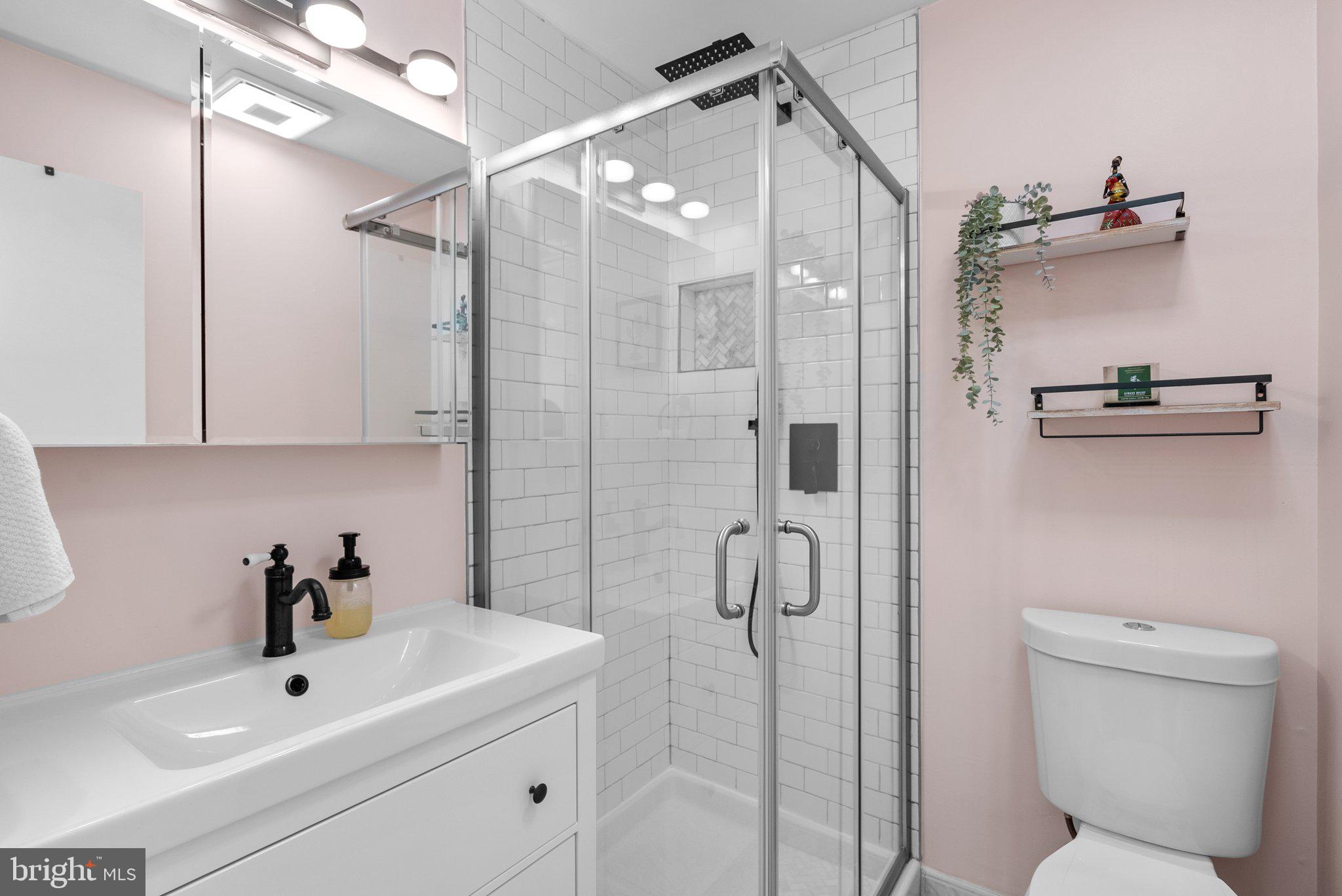 10406 Brookmoor Drive Silver Spring, MD 20901 - Photo 16 of 45 a bathroom with a sink toilet and shower