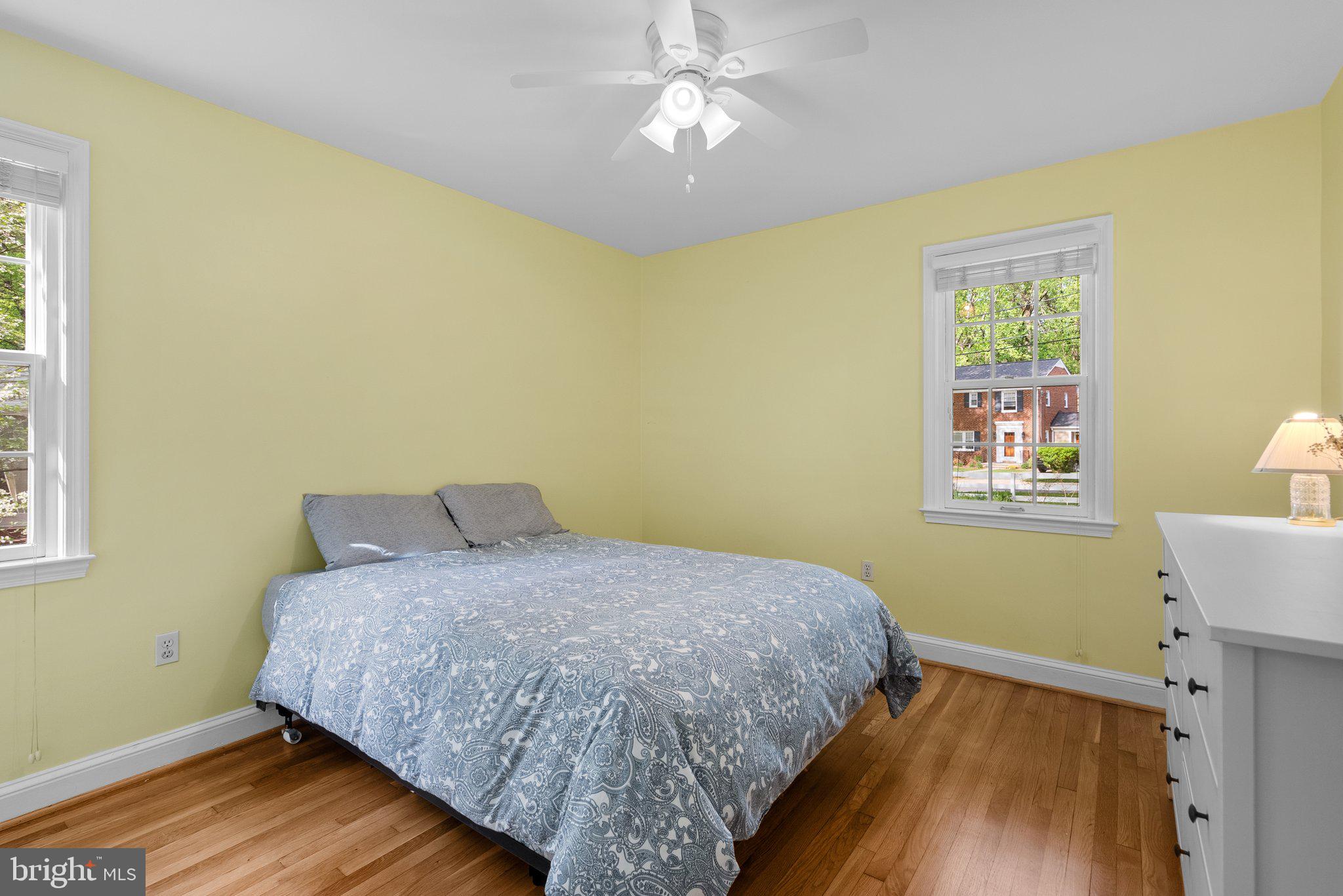 10406 Brookmoor Drive Silver Spring, MD 20901 - Photo 17 of 45 a bedroom with a bed and a window