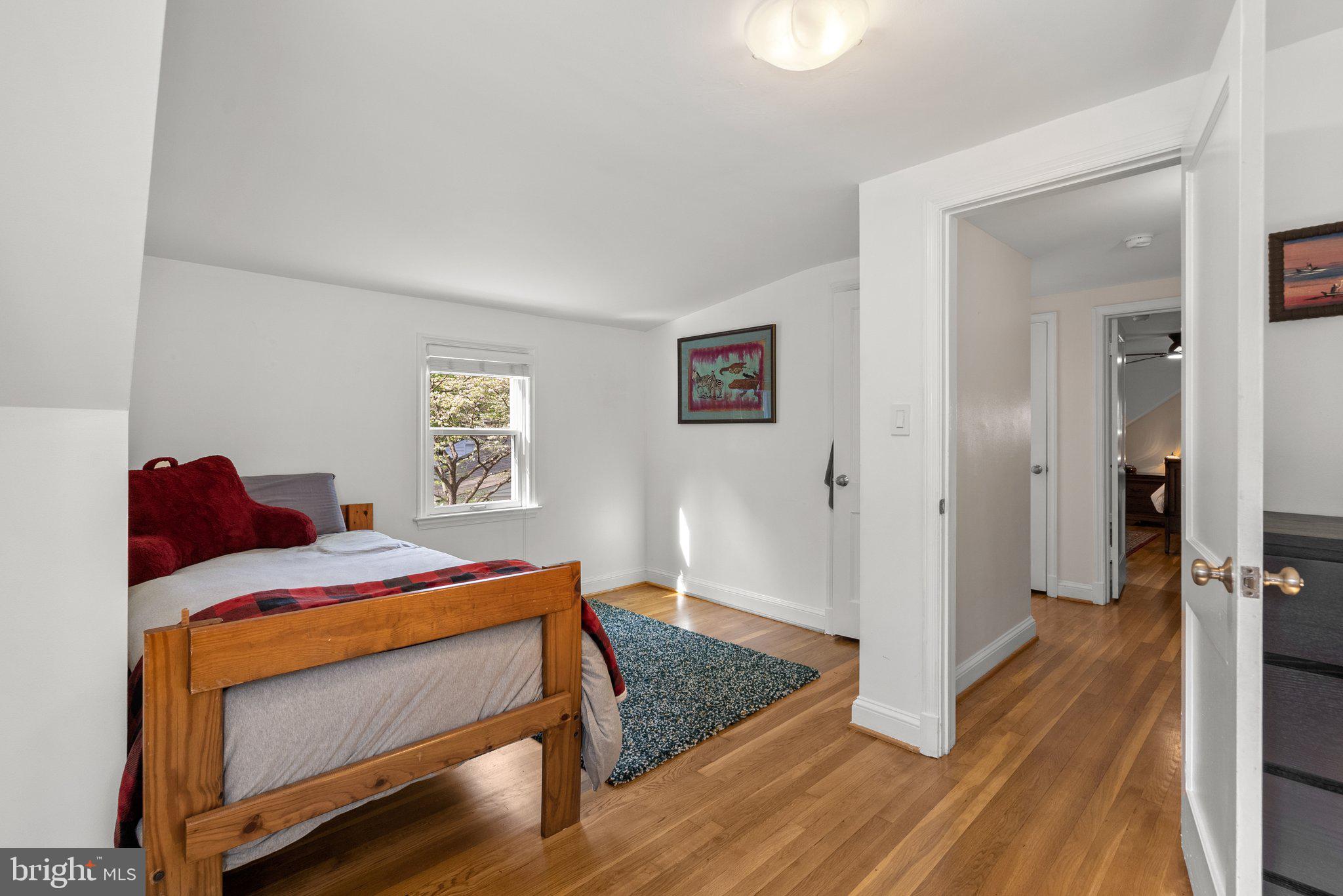 10406 Brookmoor Drive Silver Spring, MD 20901 - Photo 24 of 45 a bed room with a bed and a window