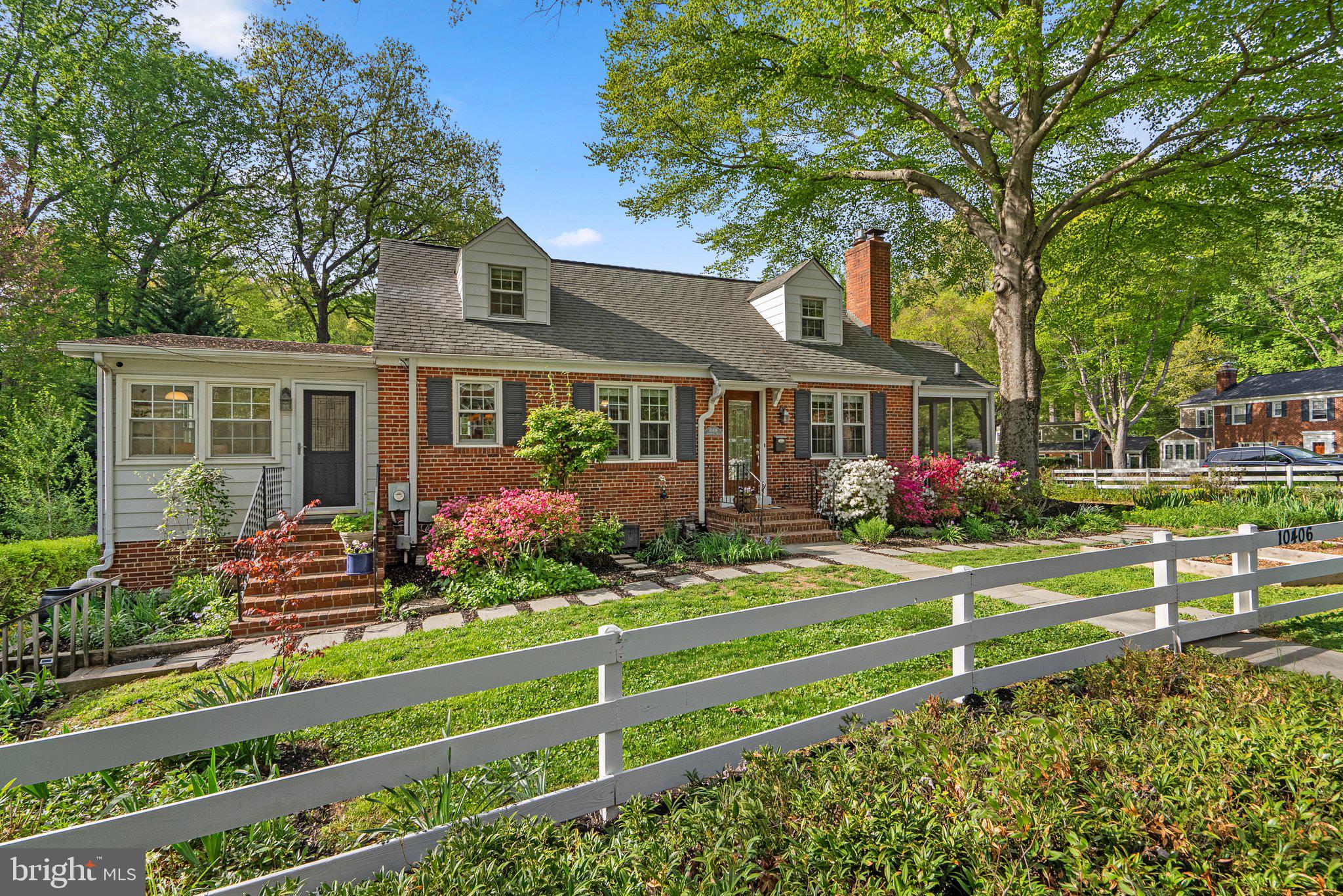 10406 Brookmoor Drive Silver Spring, MD 20901 - Photo 3 of 45 front view of a house with a yard