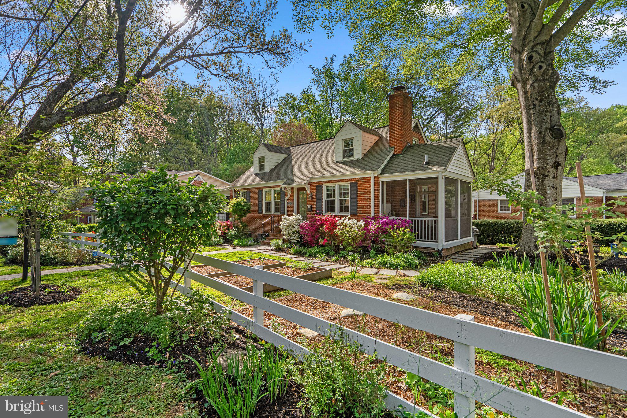 10406 Brookmoor Drive Silver Spring, MD 20901 - Photo 4 of 45 a front view of a house with garden
