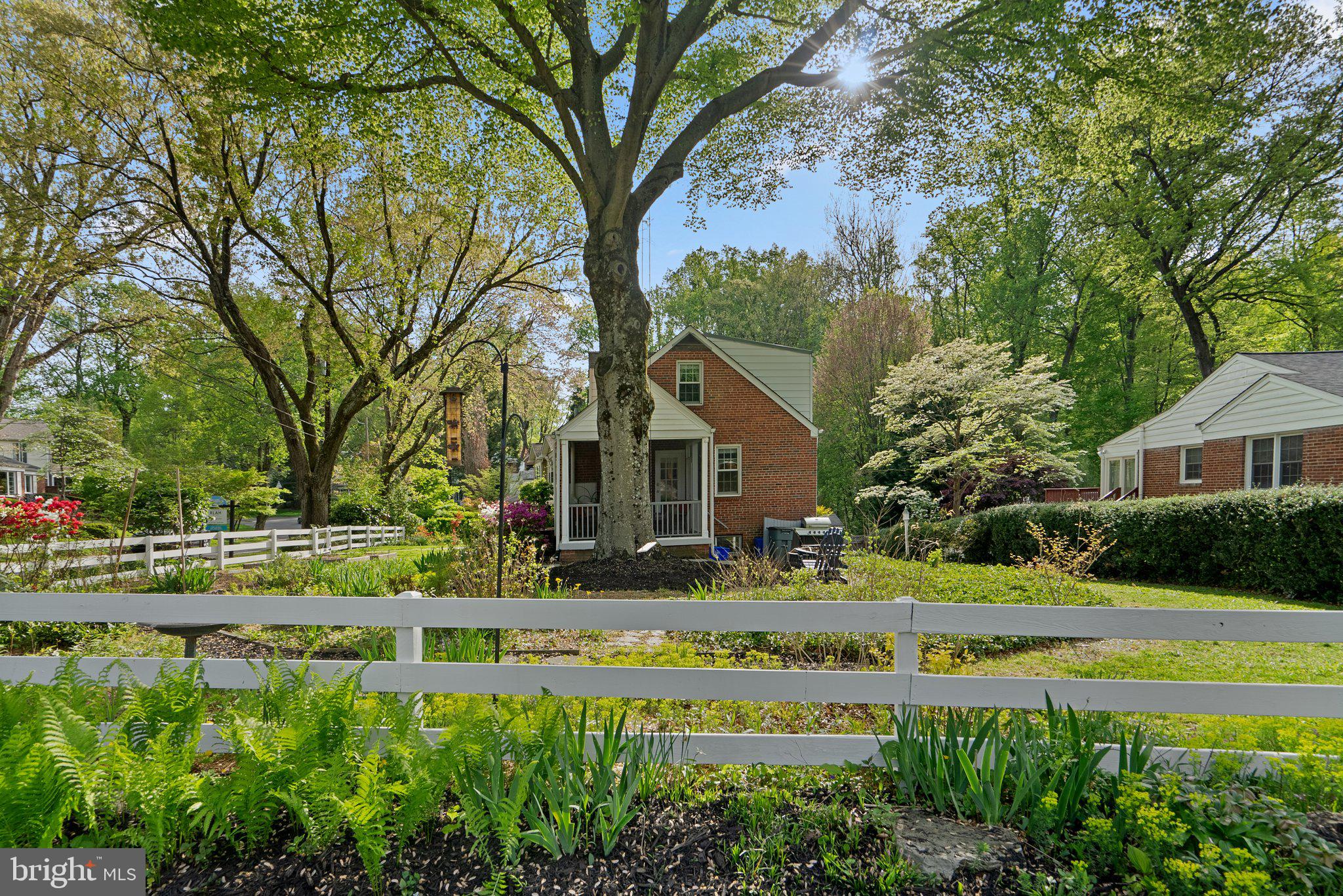 10406 Brookmoor Drive Silver Spring, MD 20901 - Photo 42 of 45 a front view of a house with a yard