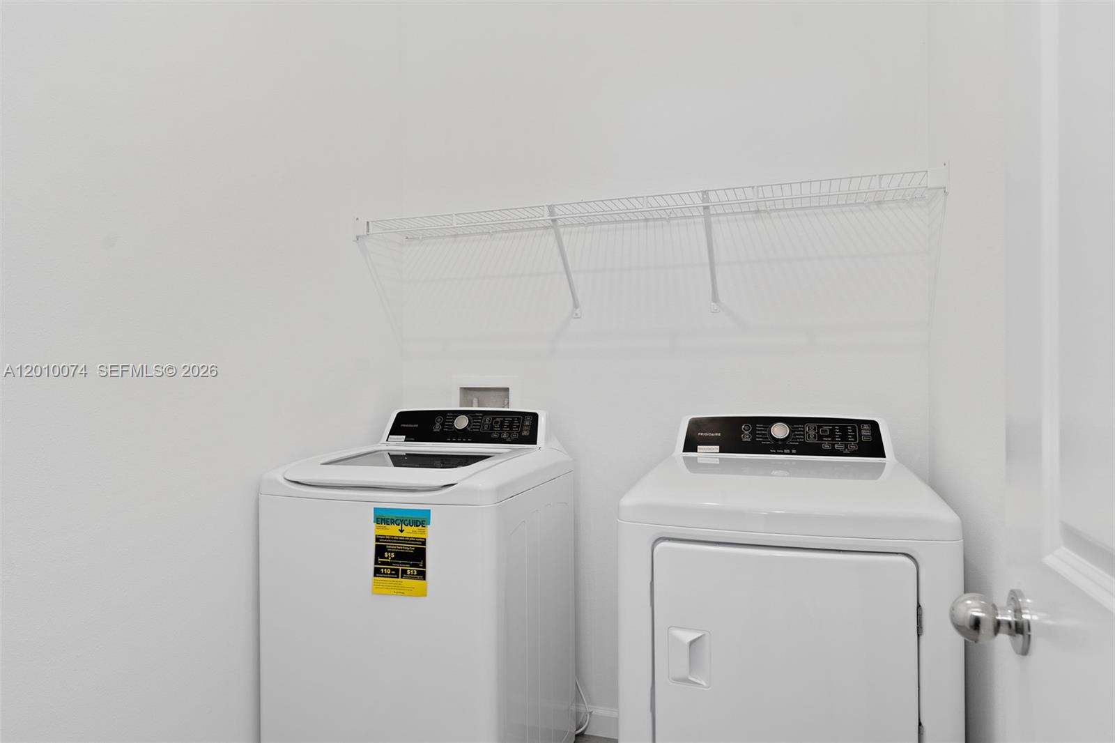 7789 Southwest 196th Terrace, Unit 1 Dunnellon, FL 34432 - Photo 18 of 36 a utility room with dryer and washer