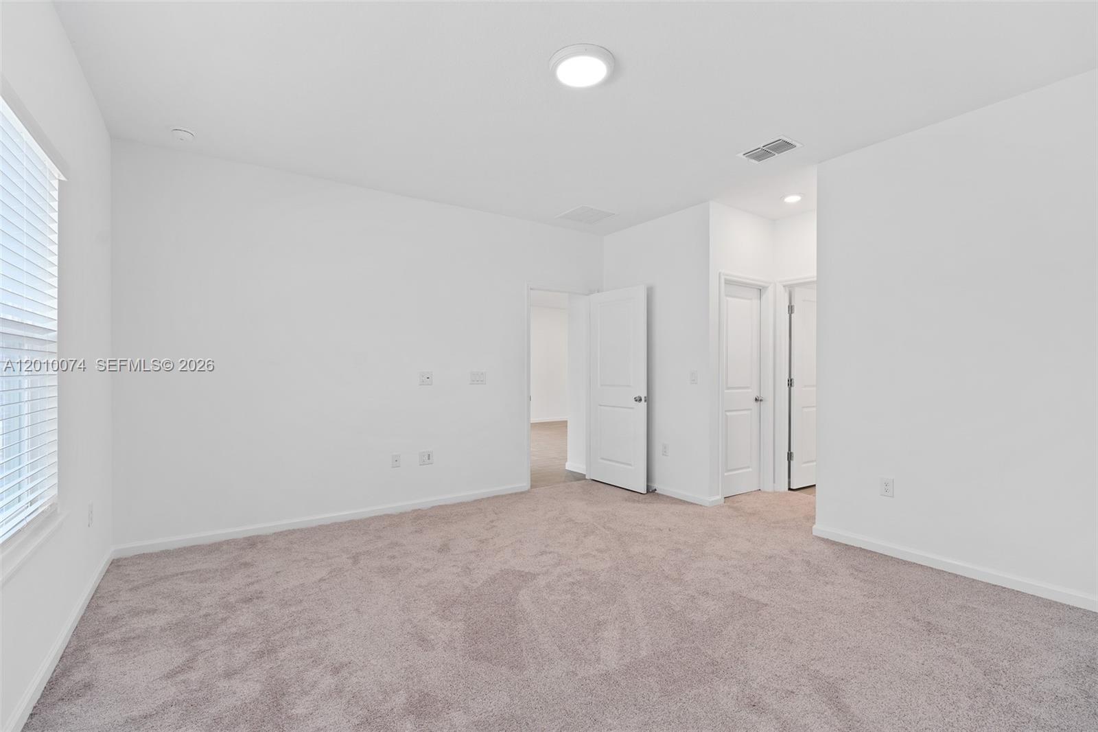 7789 Southwest 196th Terrace, Unit 1 Dunnellon, FL 34432 - Photo 29 of 36 an empty room with an entryway
