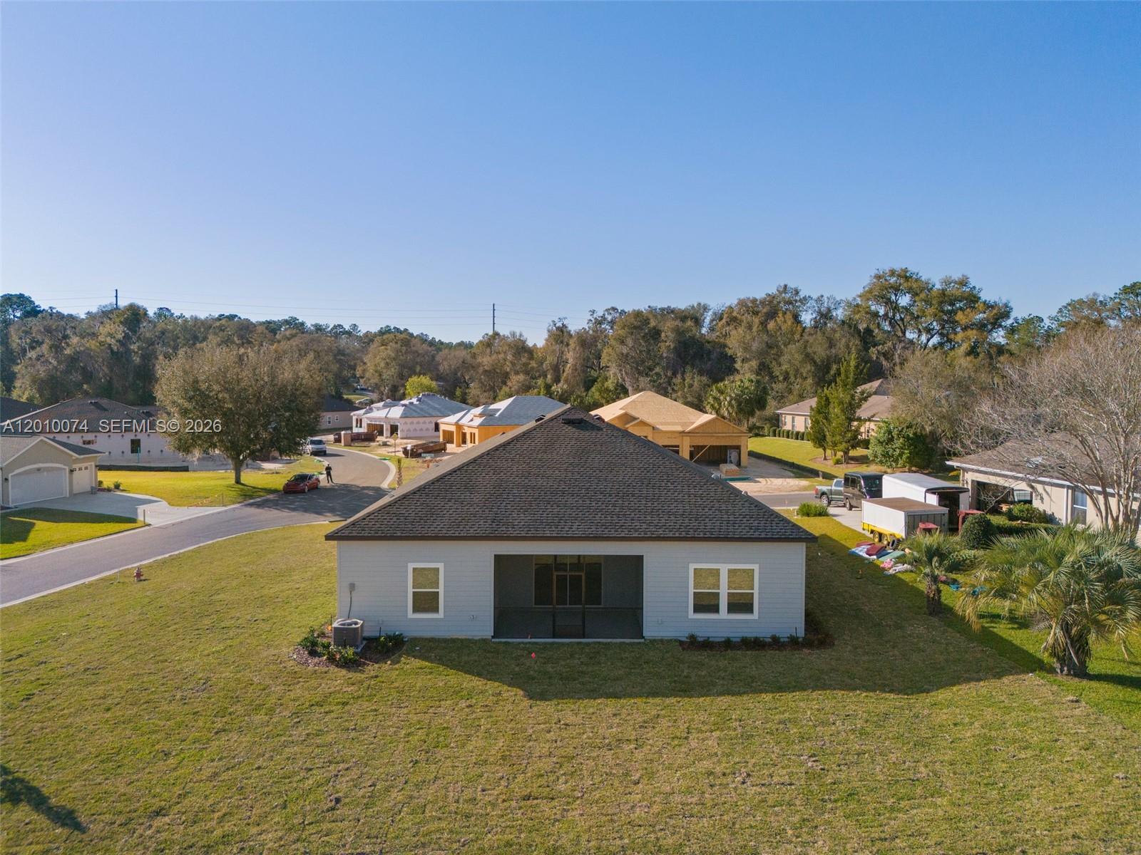 7789 Southwest 196th Terrace, Unit 1 Dunnellon, FL 34432 - Photo 36 of 36 a view of a house with a yard