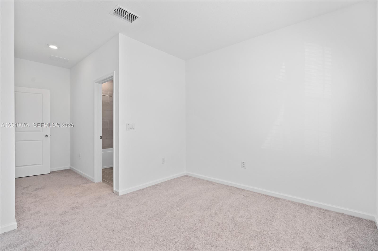 7789 Southwest 196th Terrace, Unit 1 Dunnellon, FL 34432 - Photo 8 of 36 a view of an empty room