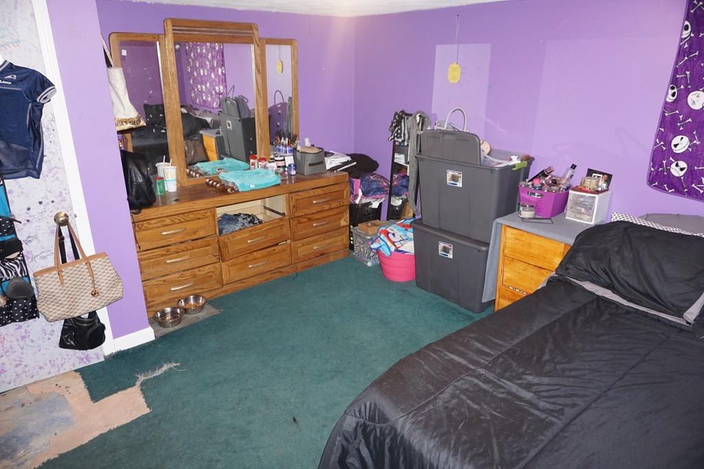 11 Payson Road Billerica, MA 01821 - Photo 8 of 14 a bed room with a bed and a television