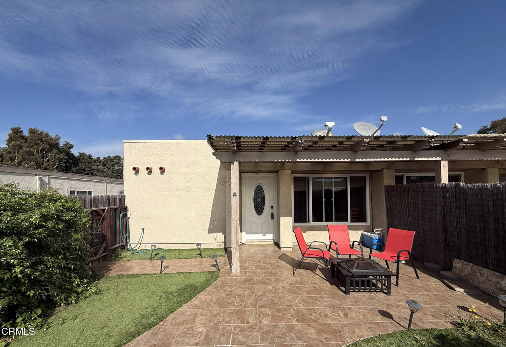 a view of a terrace with chairs