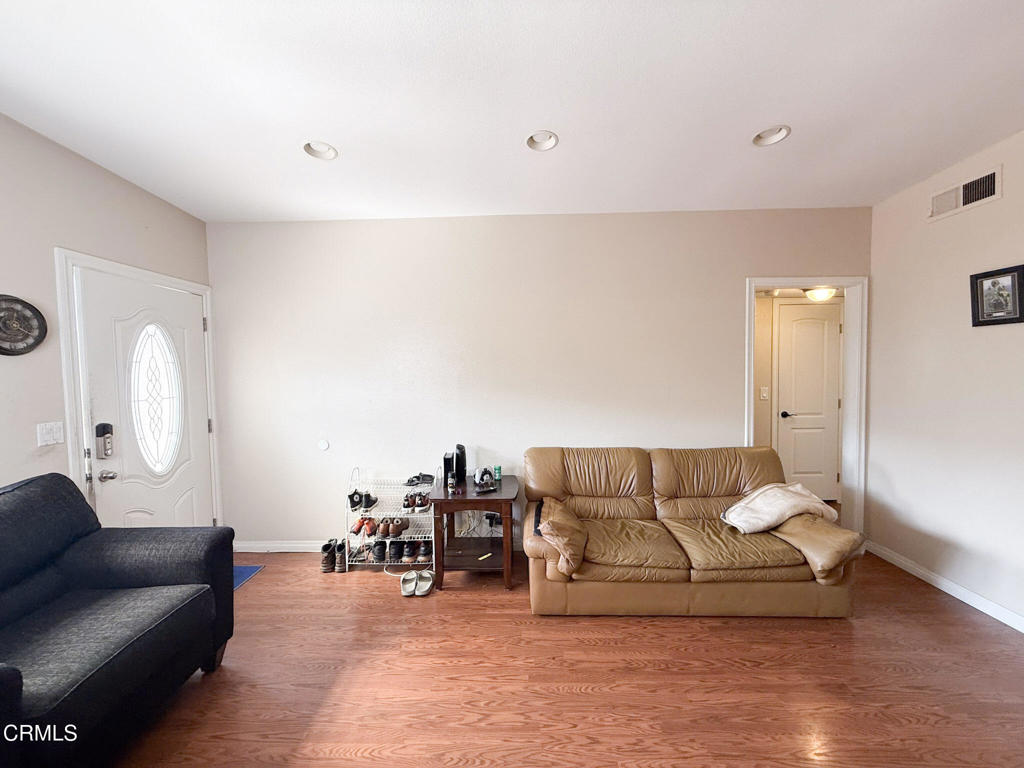 3000 Isle Way, Unit C Oxnard, CA 93035 - Photo 11 of 22 a living room with furniture and a couch