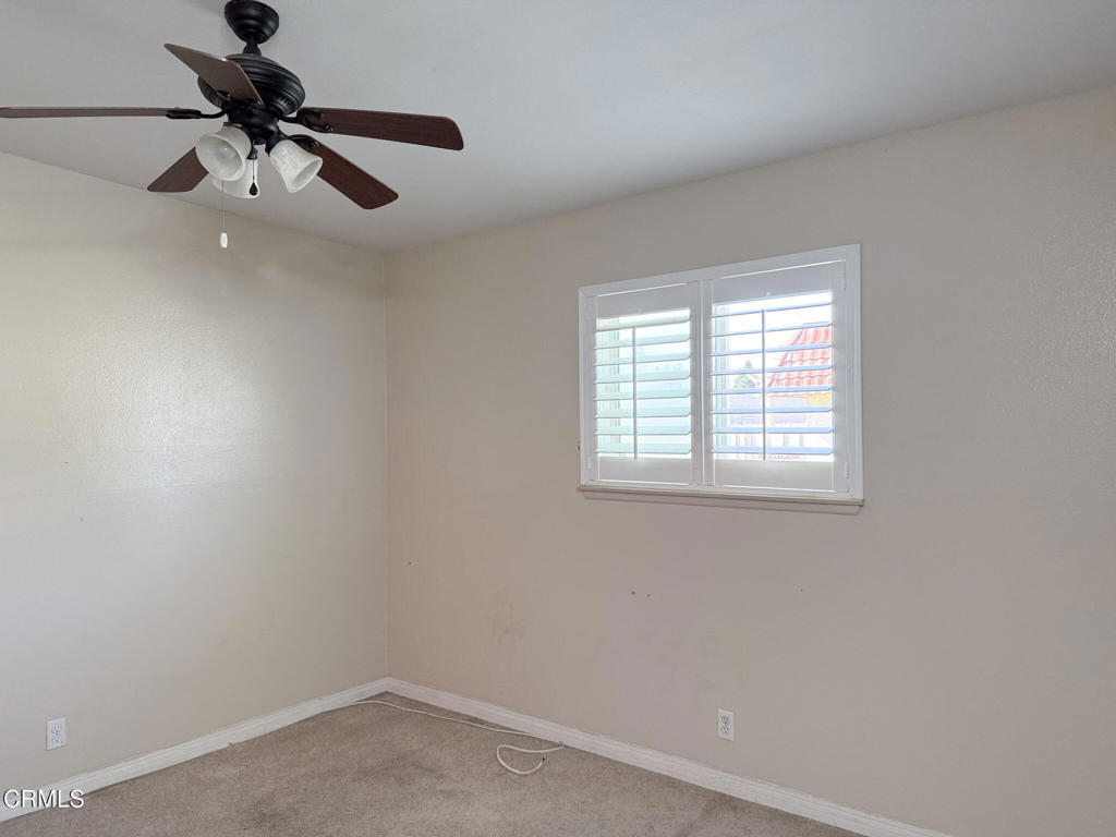 3000 Isle Way, Unit C Oxnard, CA 93035 - Photo 13 of 22 wooden floor in an empty room with a window
