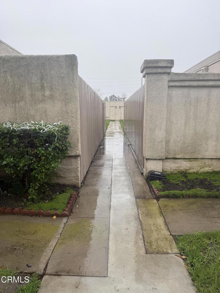 3000 Isle Way, Unit C Oxnard, CA 93035 - Photo 2 of 4 a view of a pathway both side of building