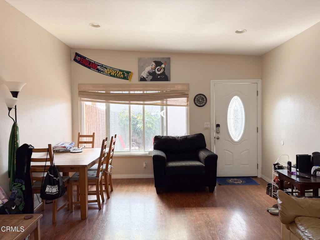 3000 Isle Way, Unit C Oxnard, CA 93035 - Photo 8 of 22 a dining room with furniture window and wooden floor