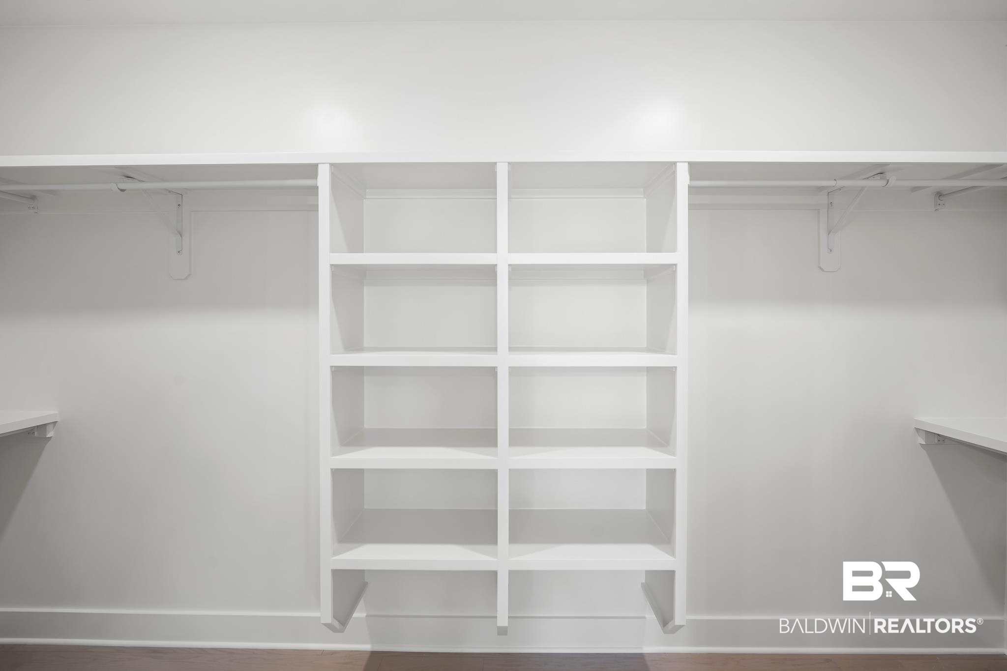 21826 Veranda Boulevard Fairhope, AL 36532 - Photo 21 of 42 Spacious closet with dark wood-style floors