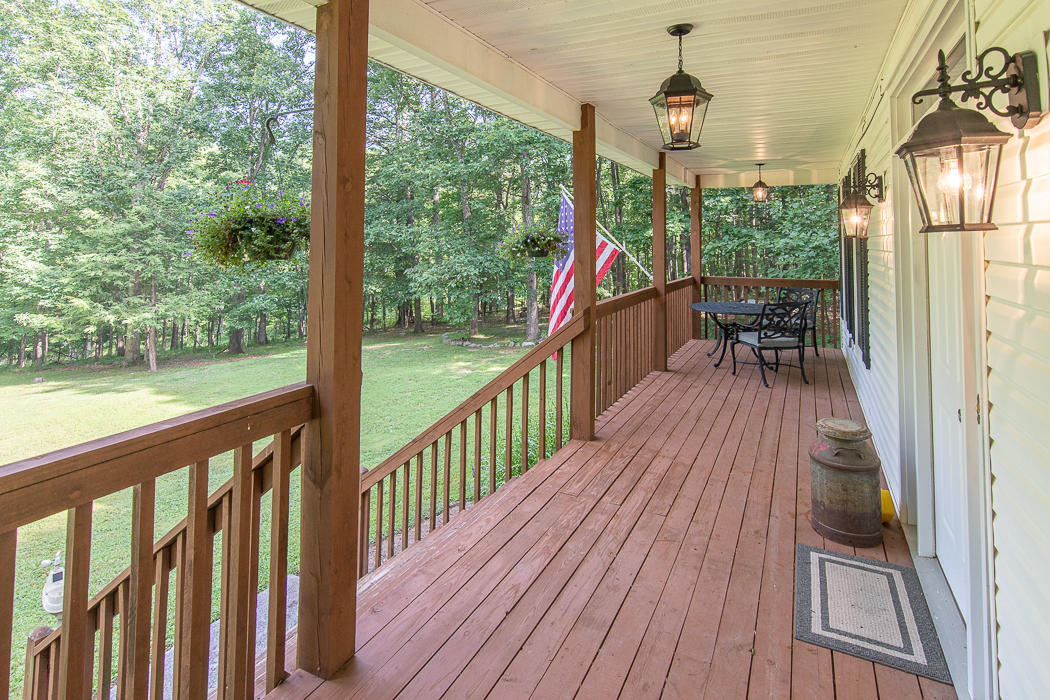 1140 Lees Gap Road Fincastle, VA 24090 - Photo 13 of 63 Relaxing Front Porch