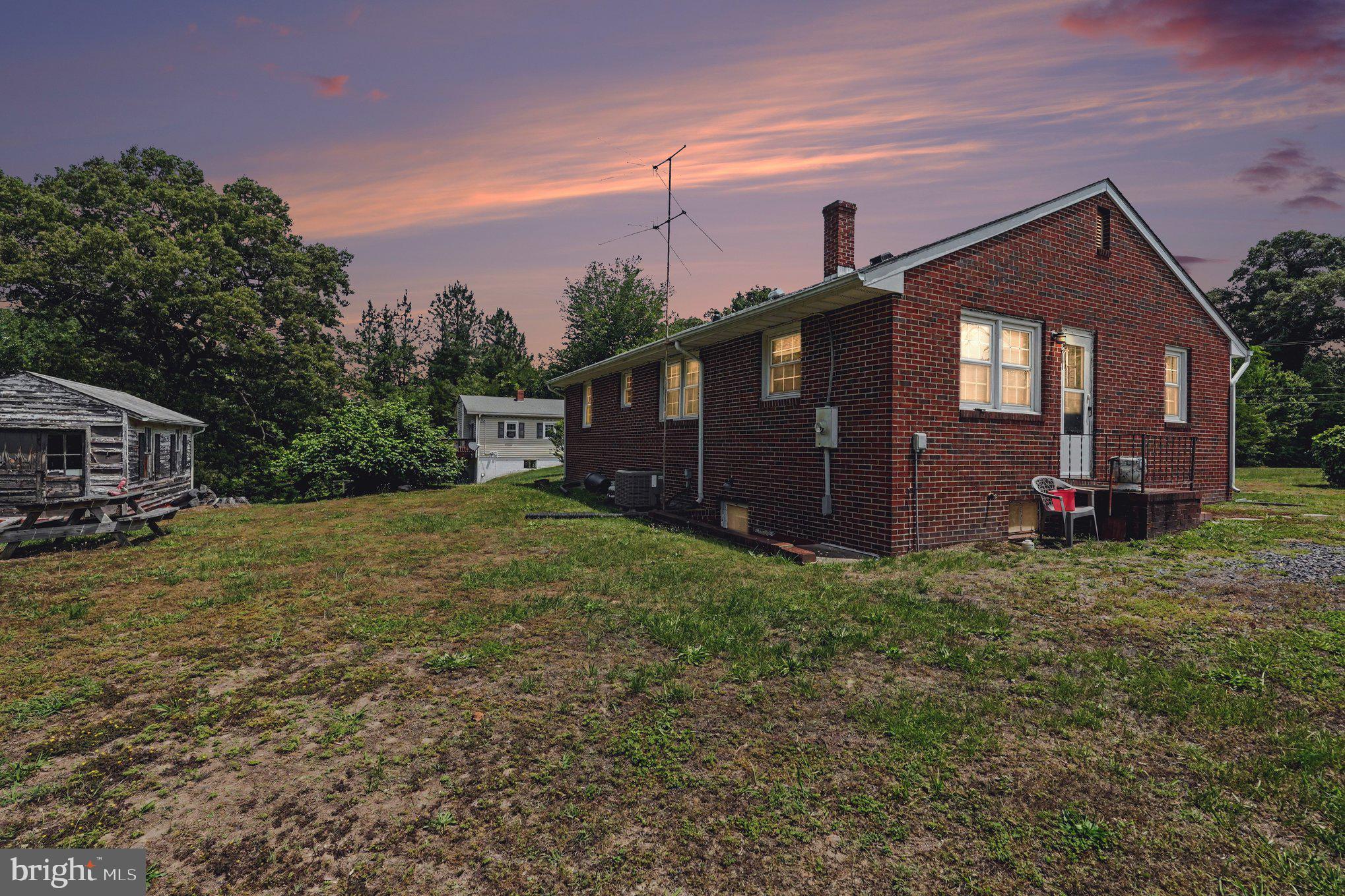 10218 Indiantown Road King George, VA 22485 - Photo 3 of 28 Charming brick home at sunset glow.