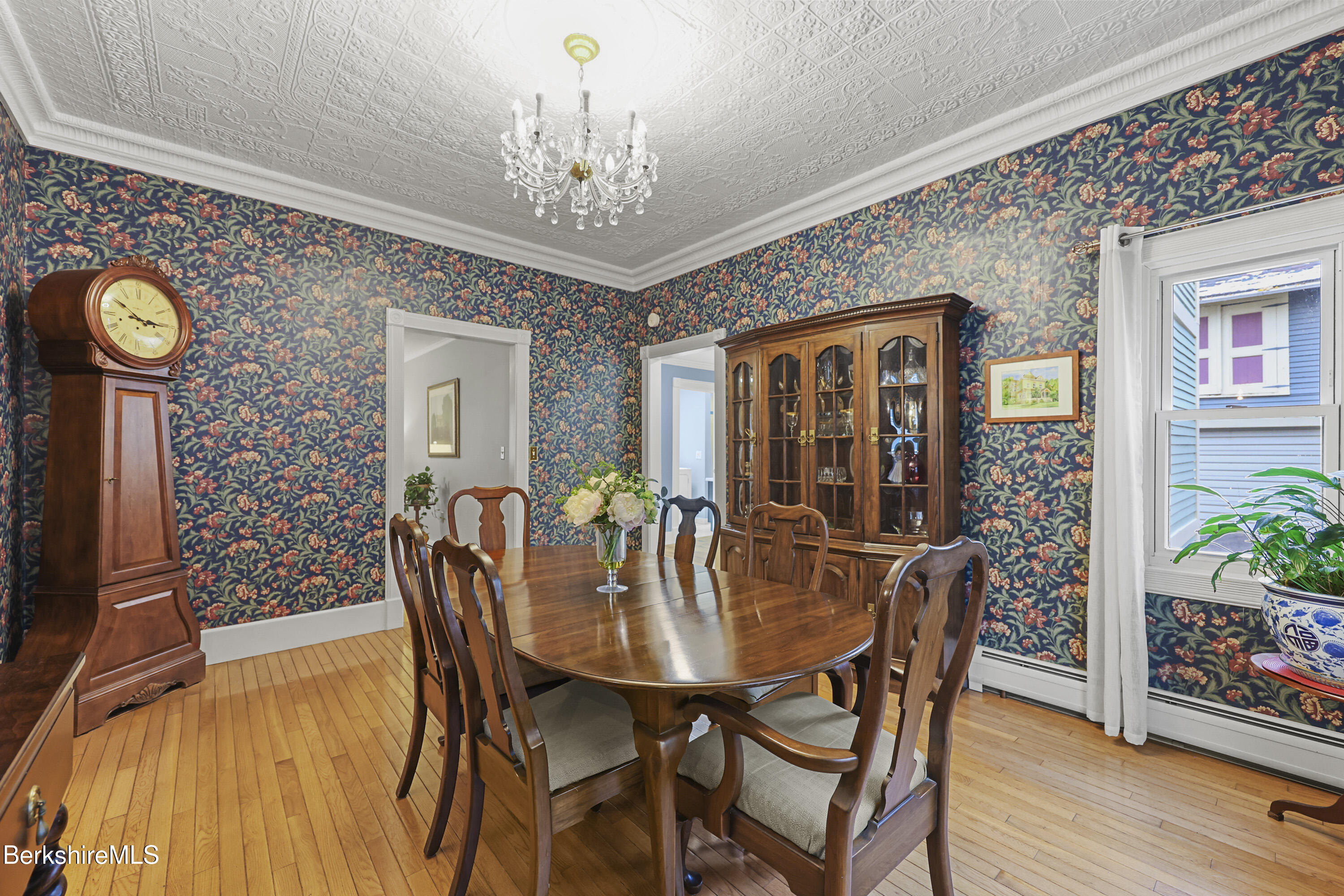 67 Cherry Street North Adams, MA 01247 - Photo 15 of 59 a view of a dining room with furniture and wooden floor