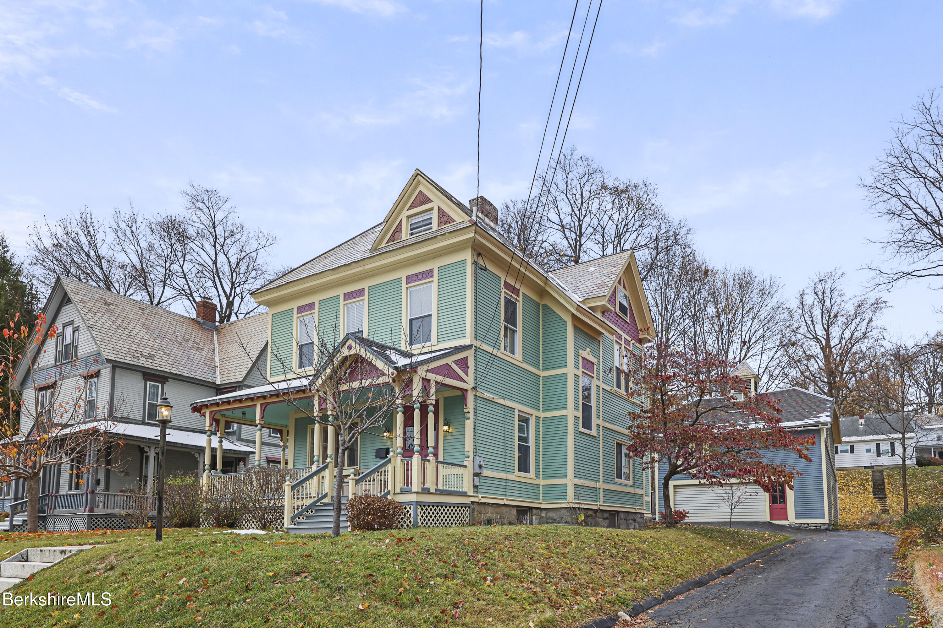 67 Cherry Street North Adams, MA 01247 - Photo 2 of 59 a front view of a house with a yard