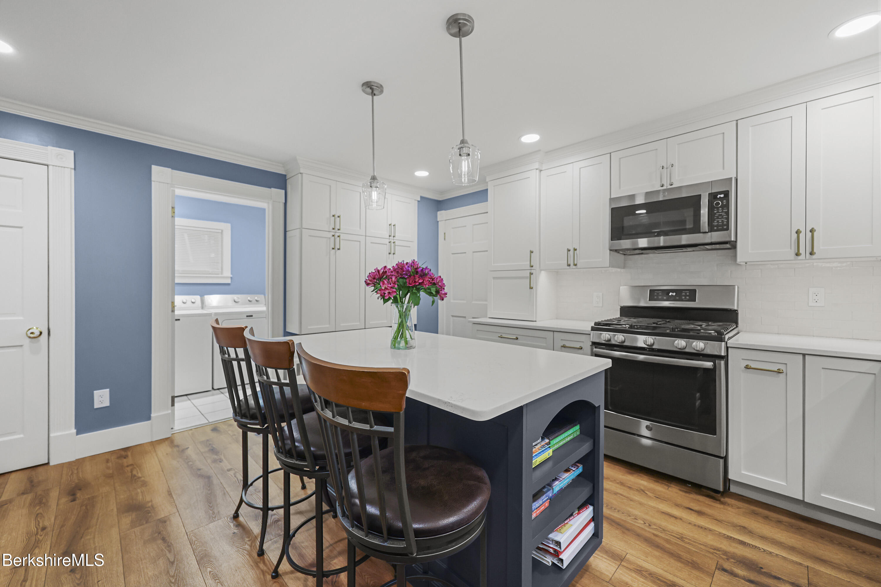 67 Cherry Street North Adams, MA 01247 - Photo 21 of 59 a kitchen that has a table and chairs in it