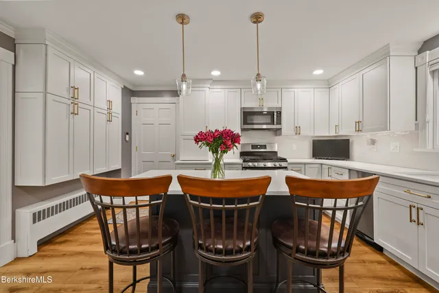 a view of a hallway with stairs