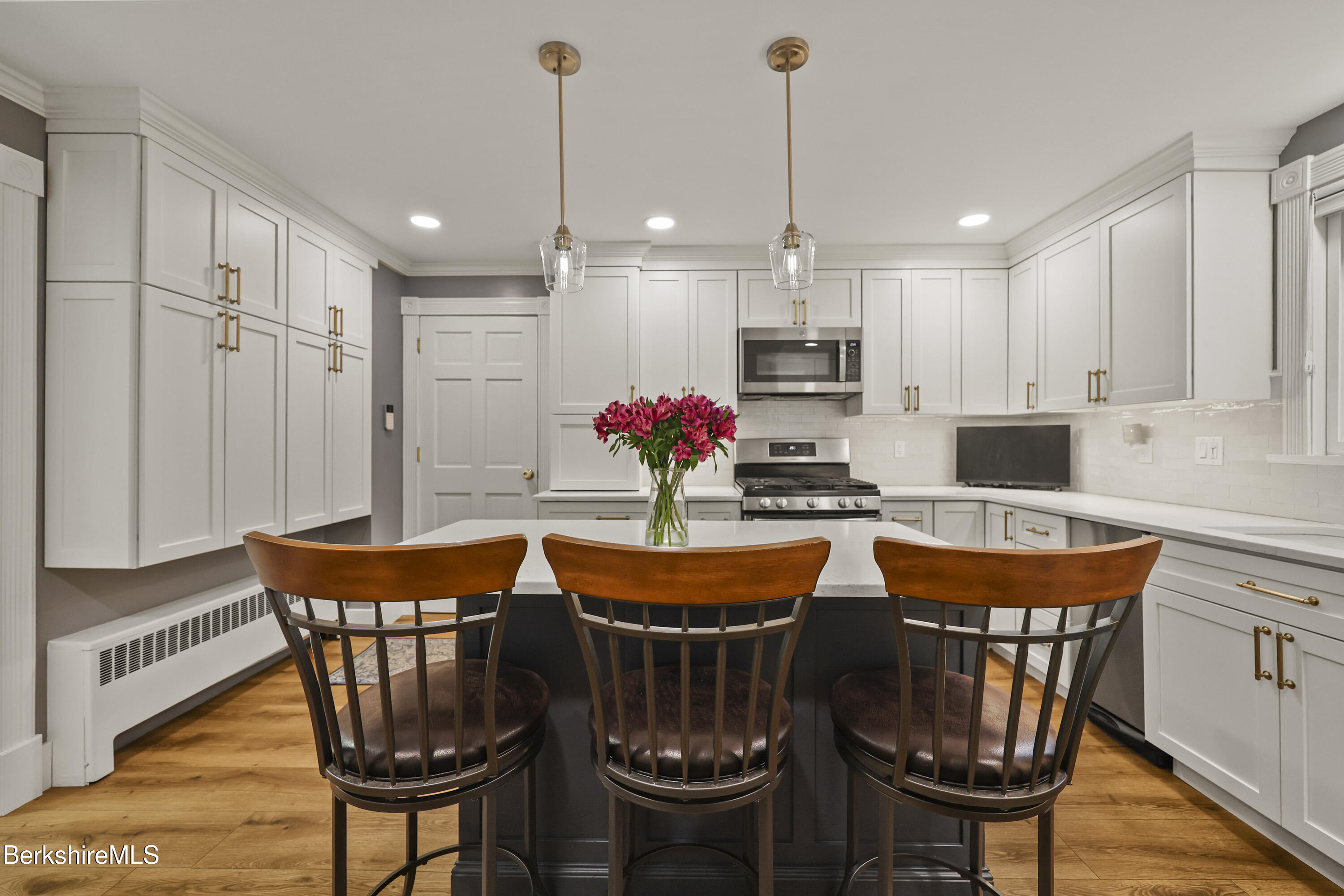 67 Cherry Street North Adams, MA 01247 - Photo 22 of 59 a view of a dining room with furniture window and wooden floor