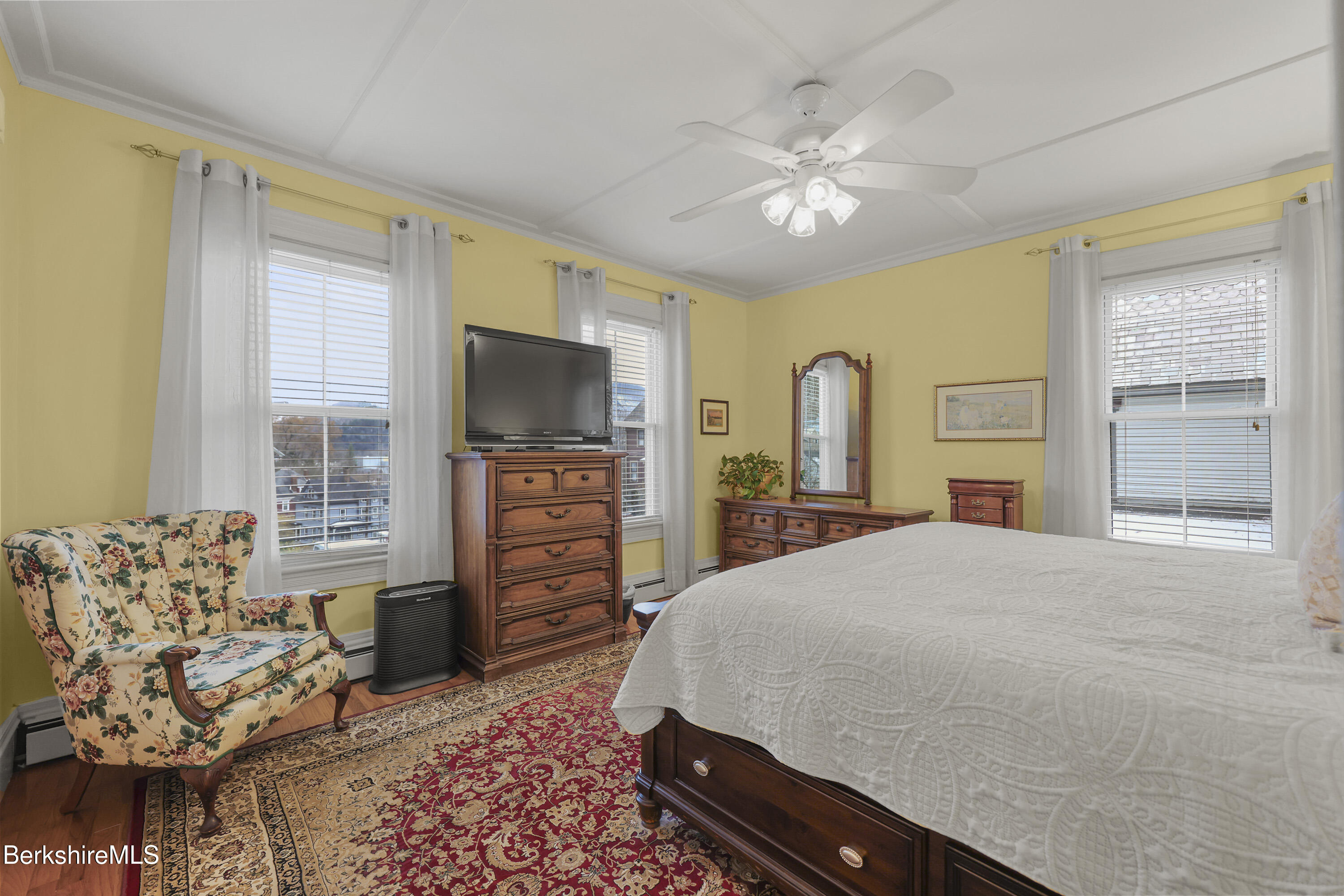 67 Cherry Street North Adams, MA 01247 - Photo 26 of 59 a bedroom with a large bed and flat screen tv