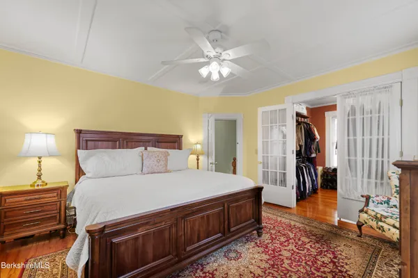 a living room with furniture a rug and a fireplace