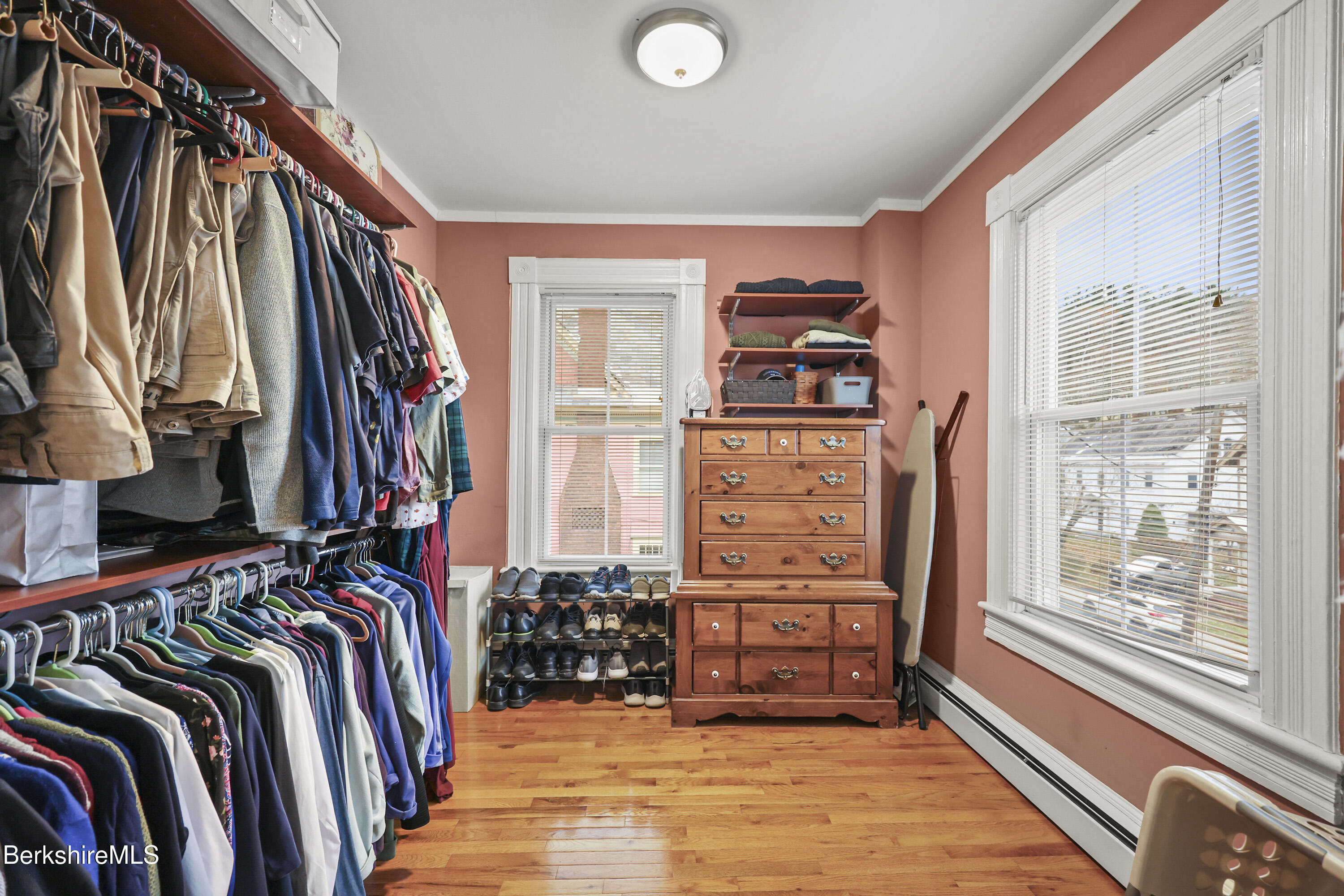 67 Cherry Street North Adams, MA 01247 - Photo 29 of 59 a view of walk in closet with clothes and shoes