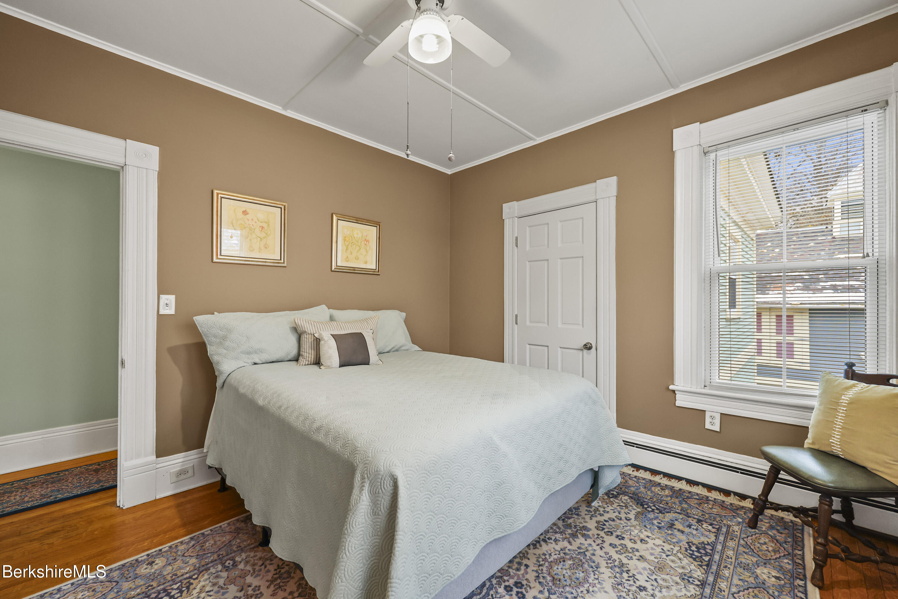 67 Cherry Street North Adams, MA 01247 - Photo 34 of 59 a bedroom with a bed and wooden floor