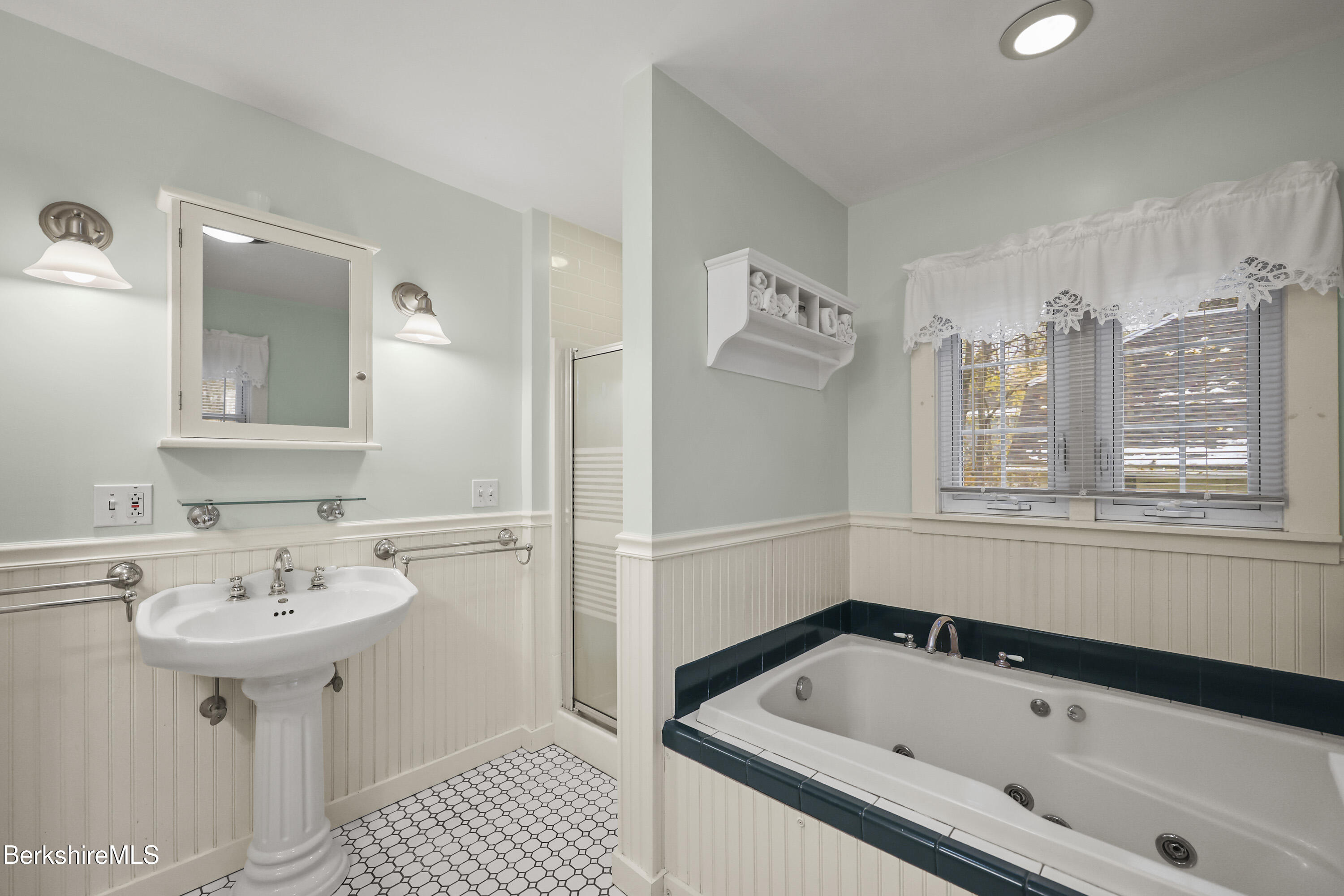 67 Cherry Street North Adams, MA 01247 - Photo 38 of 59 a bathroom with a sink and a bathtub