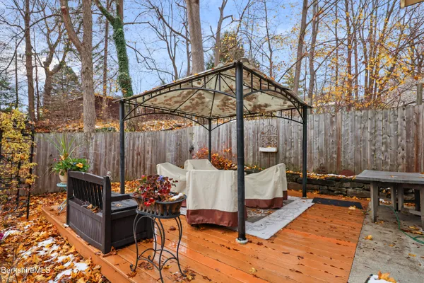 a front view of a residential apartment building with a yard