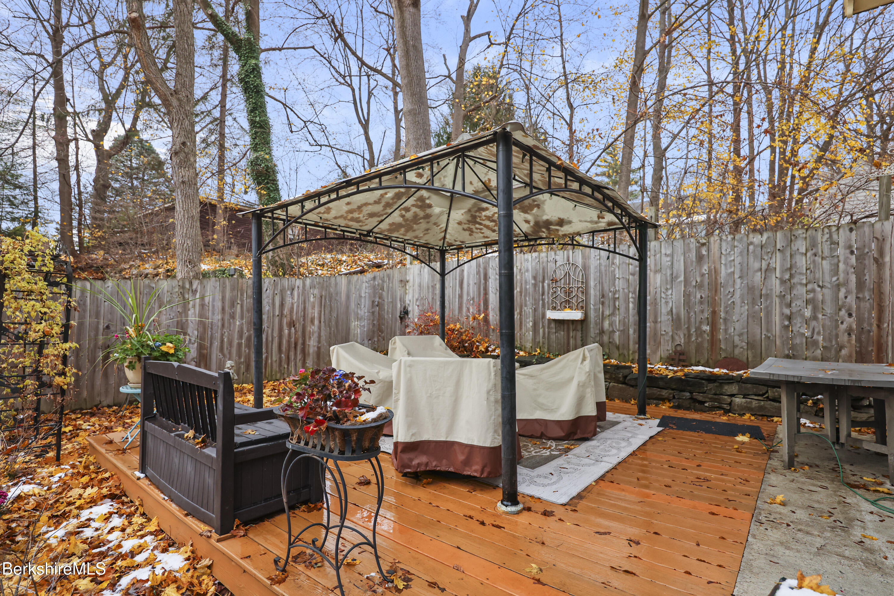 67 Cherry Street North Adams, MA 01247 - Photo 50 of 59 a view of a chairs and table in the back yard of the house