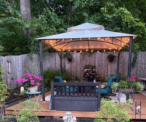 67 Cherry Street North Adams, MA 01247 - Photo 51 of 59 a view of a table and chairs under an umbrella