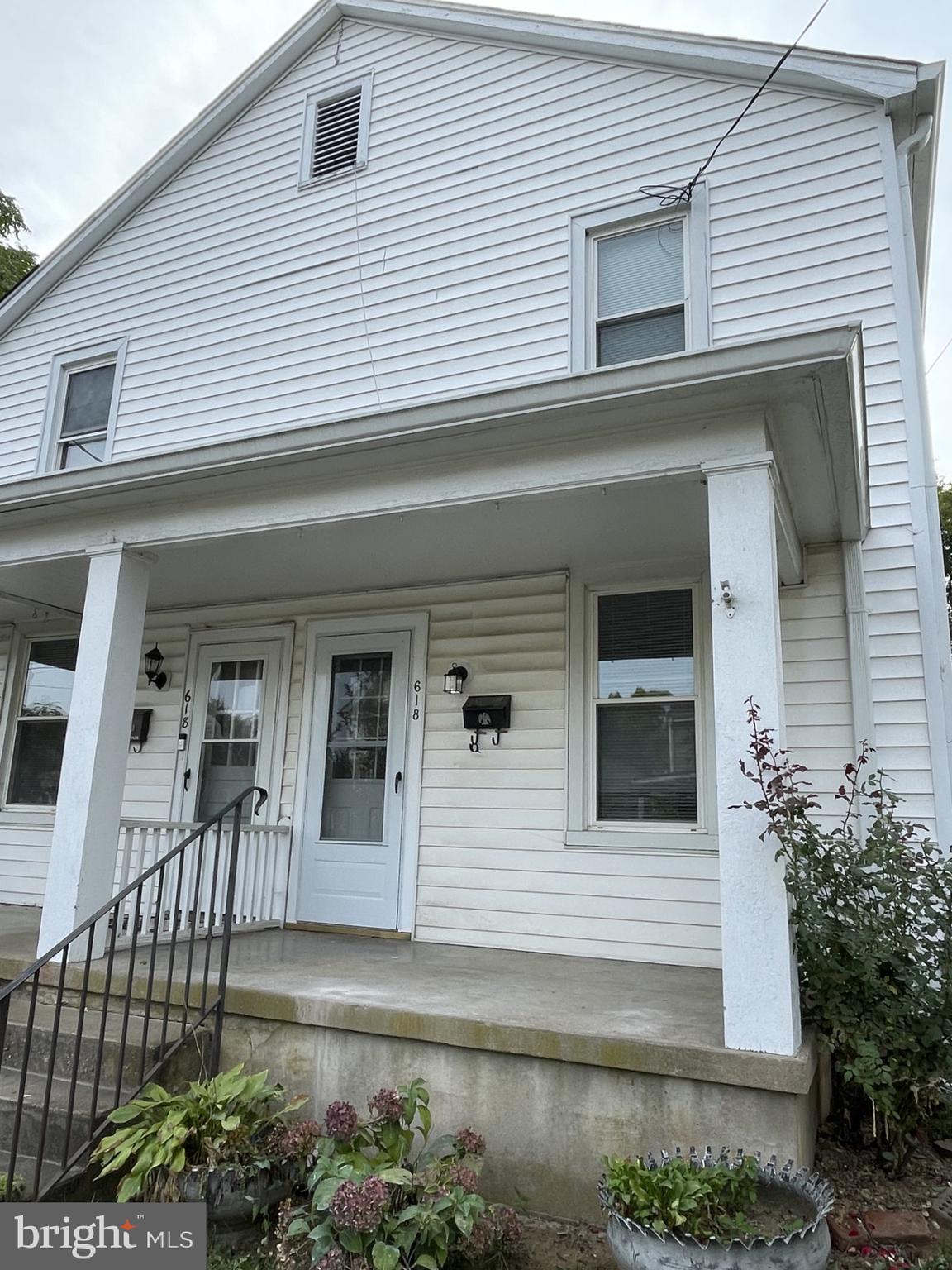 a view of a house with a porch