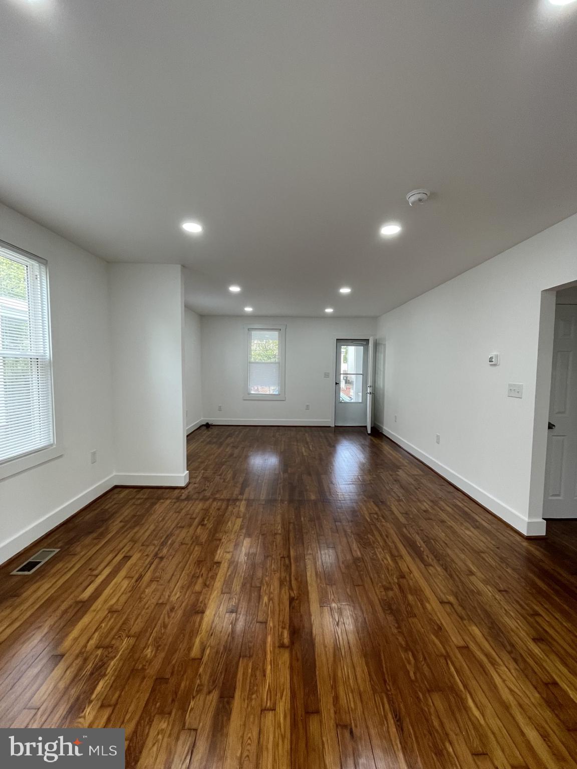 618 Wolfe Street, Unit A Fredericksburg, VA 22401 - Photo 3 of 13 a view of empty room with wooden floor
