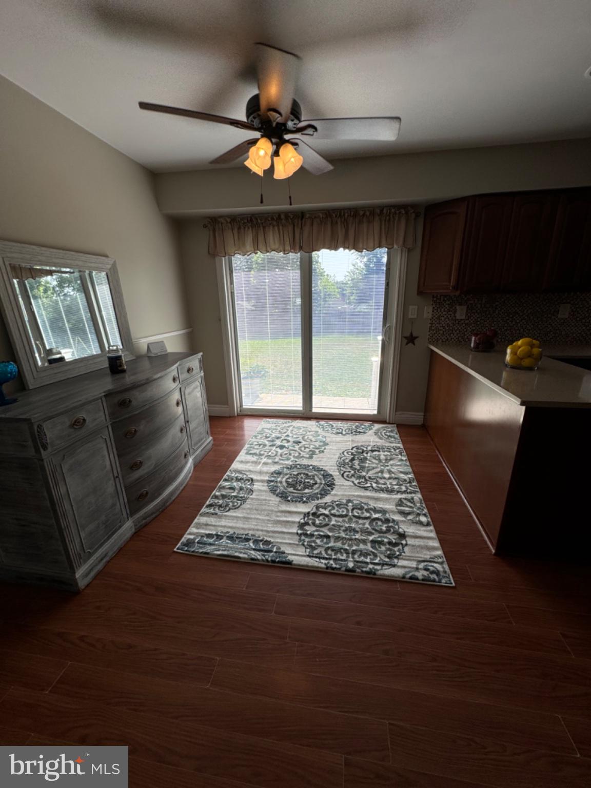 855 South Spring Road Vineland, NJ 08361 - Photo 11 of 46 a living room with hard wood floors and a fireplace
