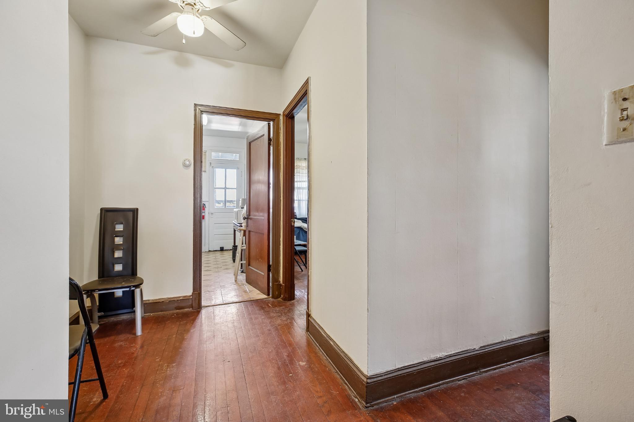 5618 1st Street Northwest Washington, DC 20011 - Photo 6 of 18 wooden floor in an empty room