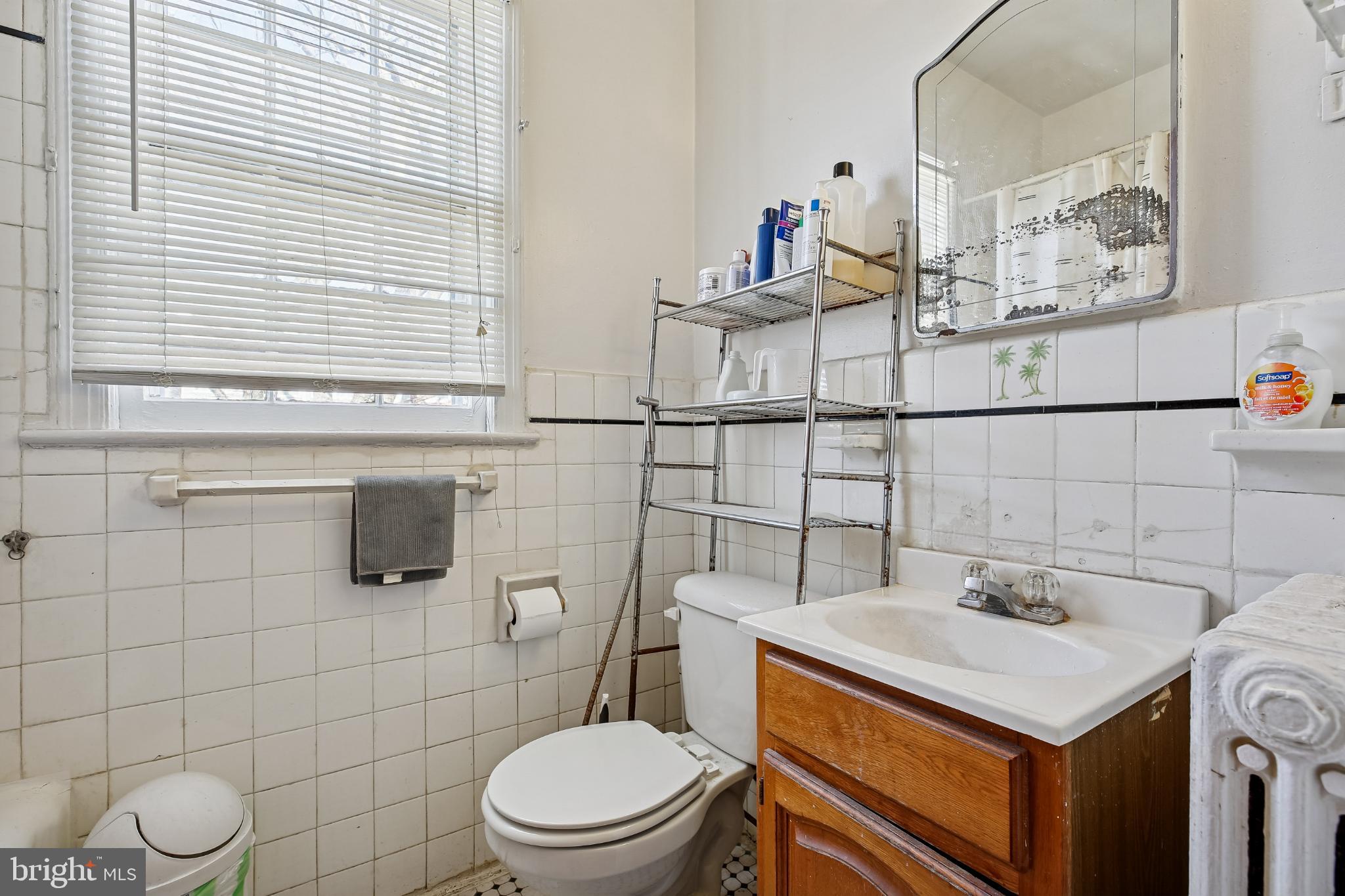5618 1st Street Northwest Washington, DC 20011 - Photo 10 of 18 a bathroom with a sink toilet and shower