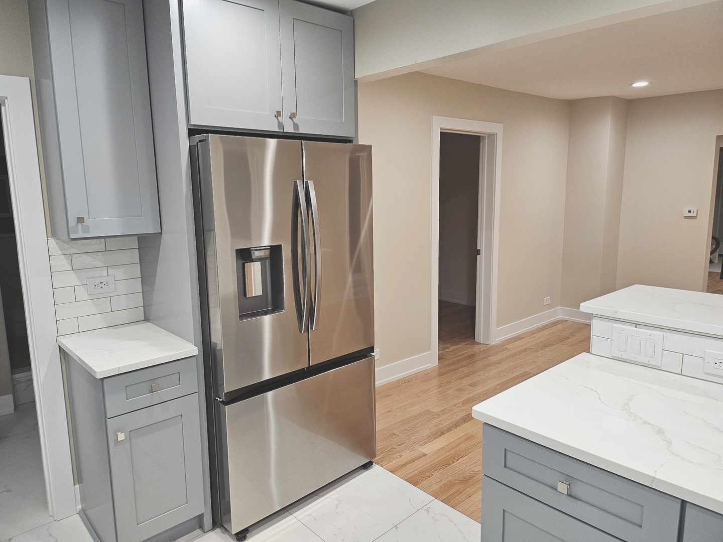 26073 West Grand Avenue Ingleside, IL 60041 - Photo 17 of 36 a kitchen with stainless steel appliances a refrigerator and a sink